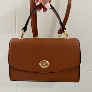 Brown and gold purse